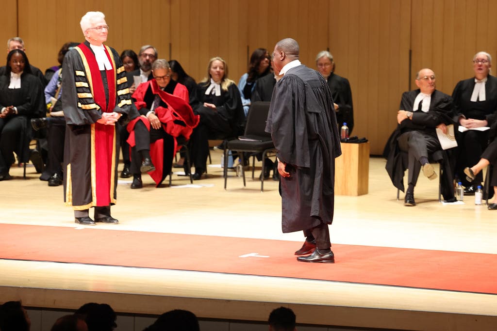 Oluwaseun Quadri on stage at the Law Society of Ontario call to the bar ceremony in Toronto